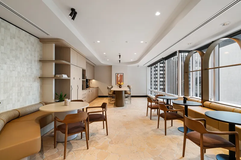 Dining area with city view at Alcove Coworking